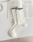 Color Trim Ruffle Cuff Crew Socks · Black