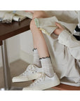 Color Trim Ruffle Cuff Crew Socks · Black