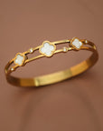 Gold Bracelet With Clover Details