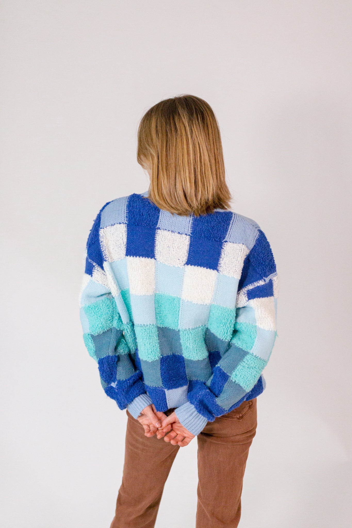 Unapologetic Checkered Sweater