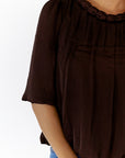 Ajen Braided Neckline Blouse · Chocolate