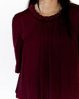 Ajen Braided Neckline Blouse · Wine
